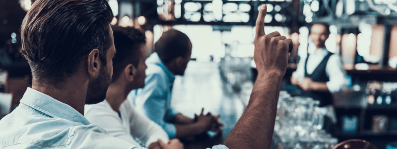 Men Sitting at the Bar